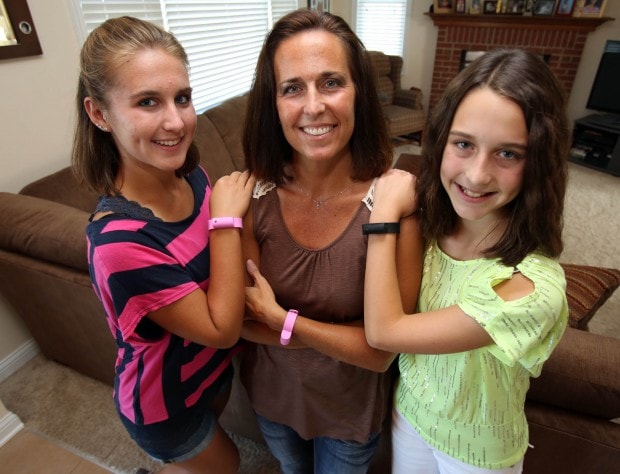 caroline-olah-and-her-daughters-min.jpg